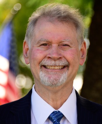 Dean Cherpelis, DDS, FAGD, at Bell Family Dental in Bayside, NY
