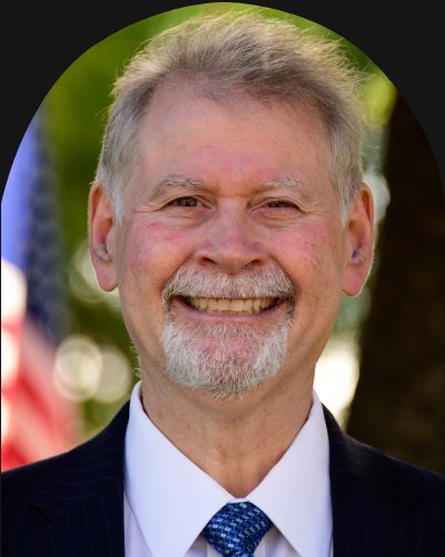 Dean Cherpelis, DDS, FAGD, at Bell Family Dental in Bayside, NY
